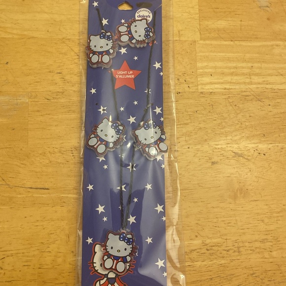 NWT Hello Kitty light up patriotic necklace Acrylic charms on wire NWT - Picture 7 of 8